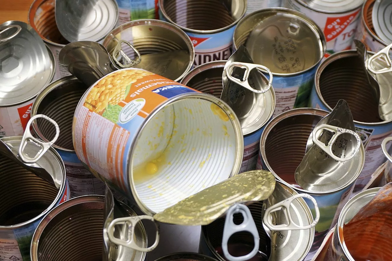 Opened food can, used packaging